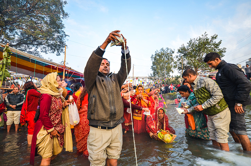 Devotees offering prayers to the Sun on Chhat Festival.